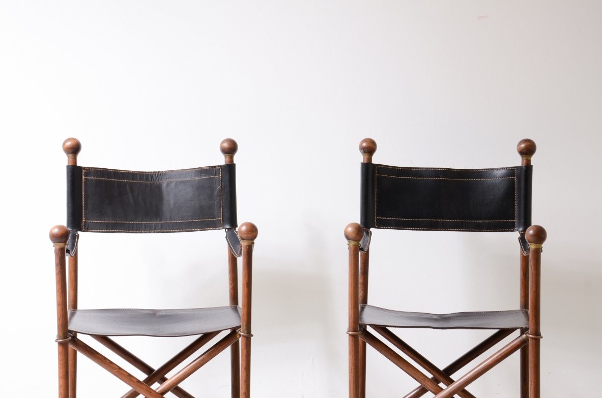 pair of turned wood folding chairs with leather seat, Pierre Lottier for Valenti. Spain 40's