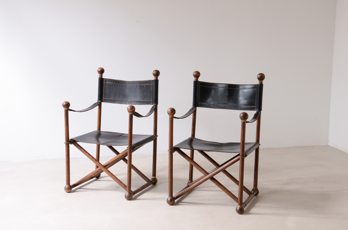 pair of turned wood folding chairs with leather seat, Pierre Lottier for Valenti. Spain 40's