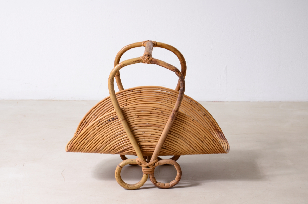 Large magazine rack made of curved rattan.  Italian manufacture, Tuscany, circa 1960s.
