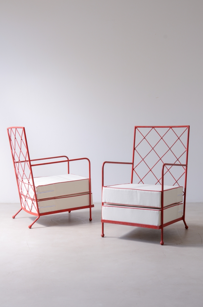 Pair of iron and iron rod armchairs  handcrafted from a design by Jean Royere.