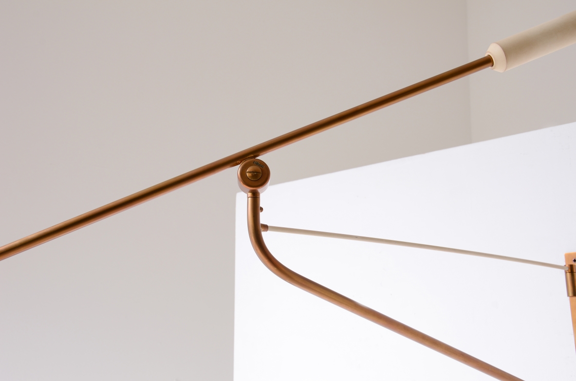 Stilnovo Milano, Adjustable lamp with a brass stem and painted metal shade.