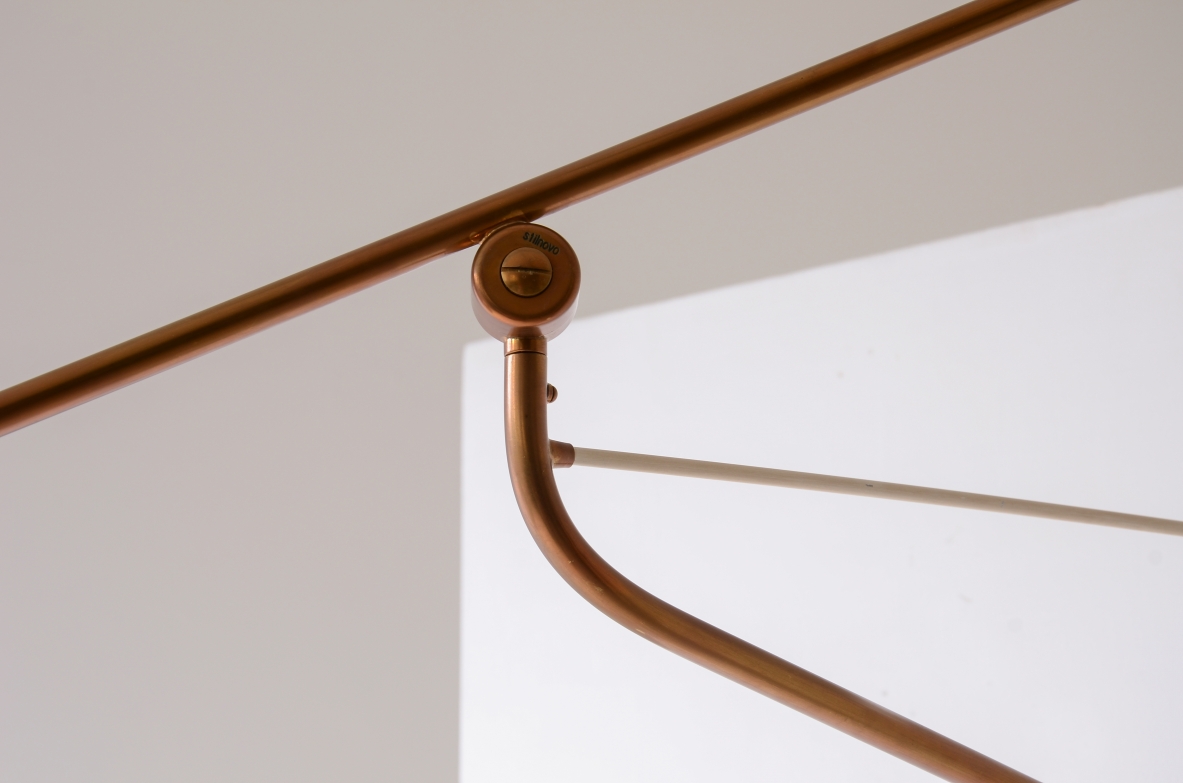 Stilnovo Milano, Adjustable lamp with a brass stem and painted metal shade.