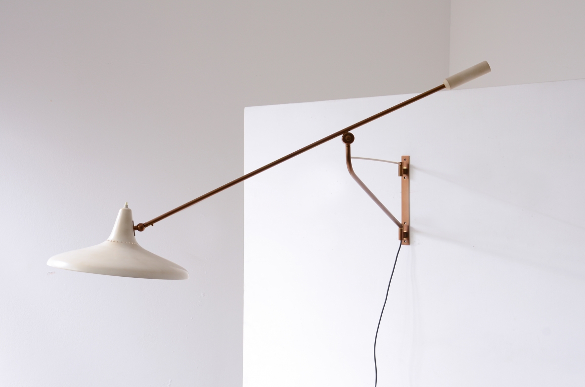 Stilnovo Milano, Adjustable lamp with a brass stem and painted metal shade.