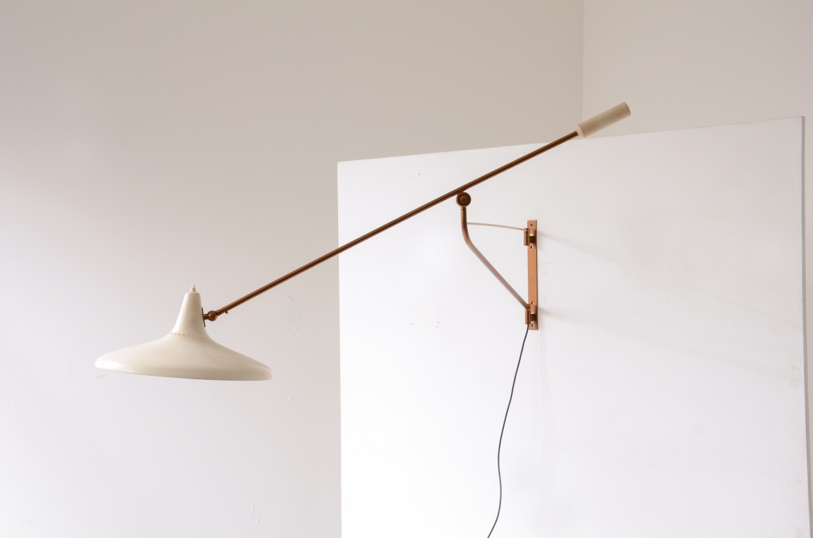Stilnovo Milano, Adjustable lamp with a brass stem and painted metal shade.