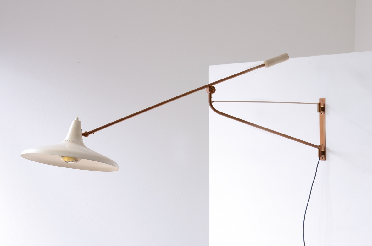 Stilnovo Milano, Adjustable lamp with a brass stem and painted metal shade.
