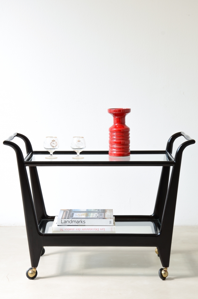 Stained wood serving trolley with two cut glass shelves.  Italian manufacture, ca. 1950.