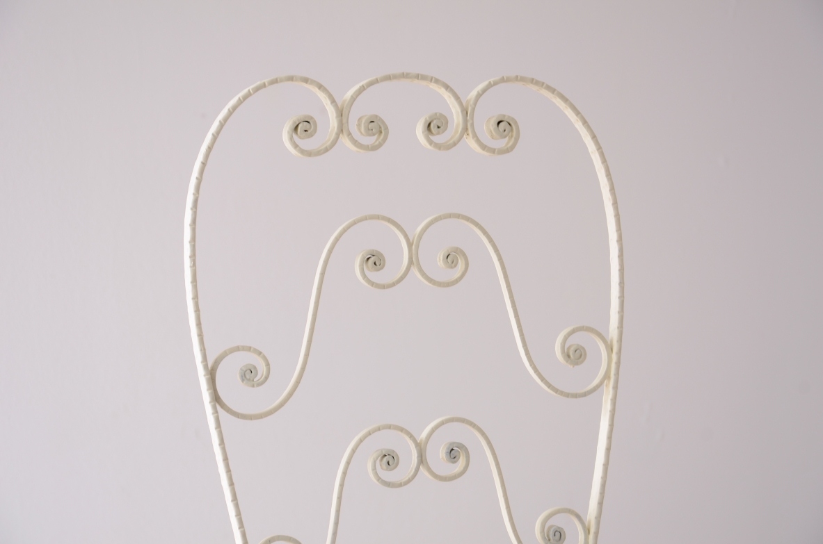 Pierluigi Colli Due sedie in ferro battuto con schienale alto decorato a riccioli, Torino 1950 