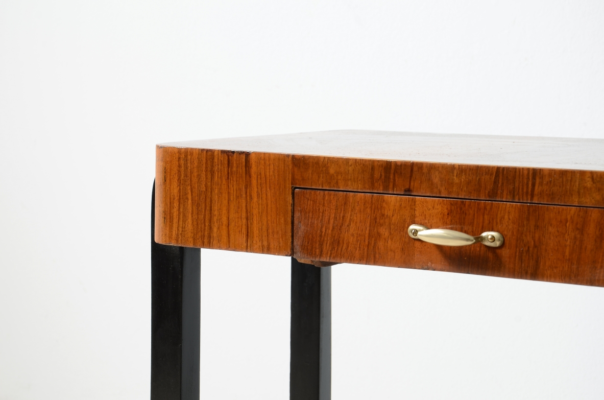 Walnut and stained wood coffee table with two shelves. Made in the 1930s.
