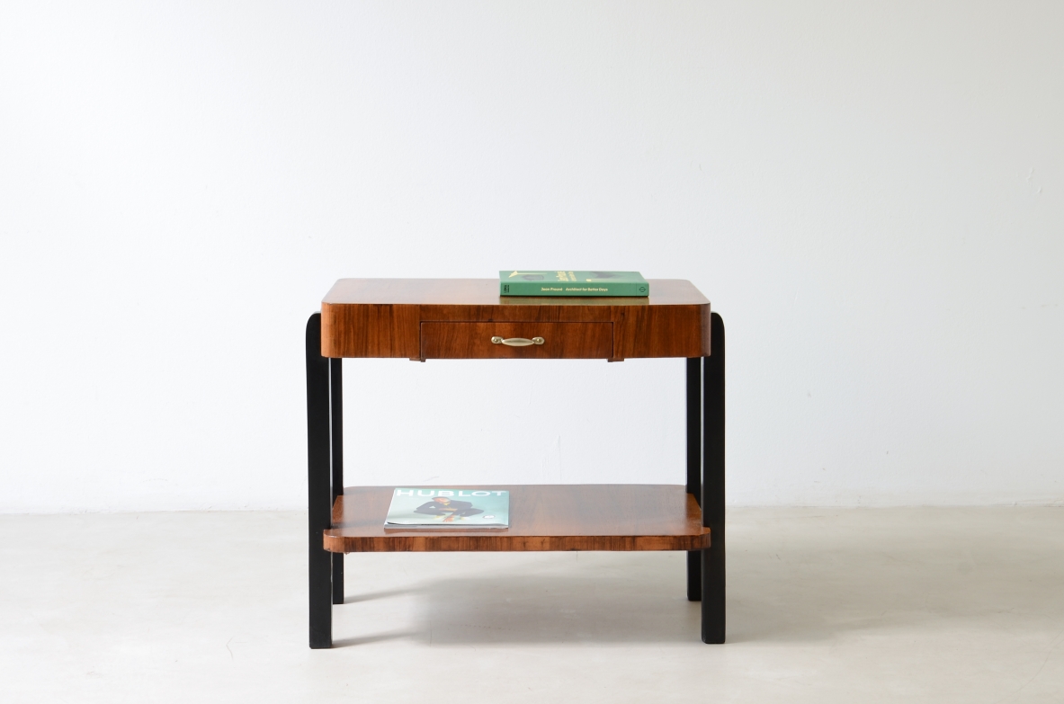 Walnut and stained wood coffee table with two shelves. Made in the 1930s.