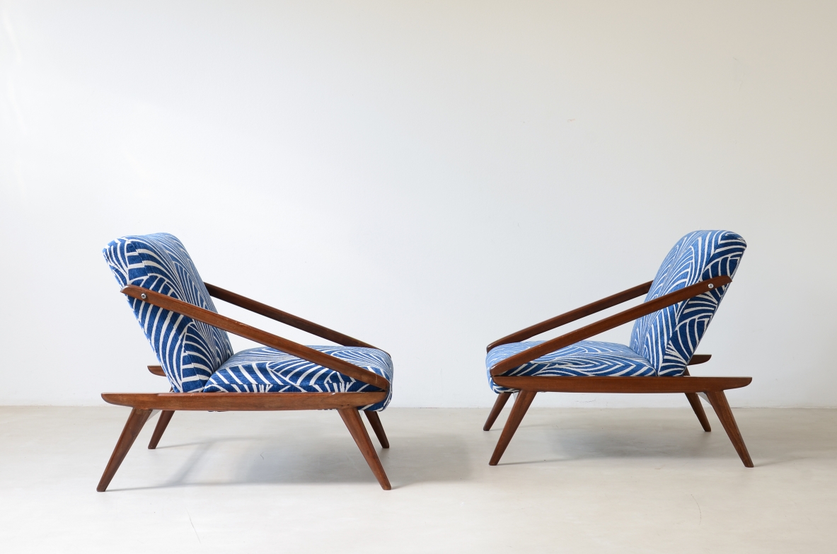 pair of wooden reclining armchairs, Made by ISA Bergamo in 1954.