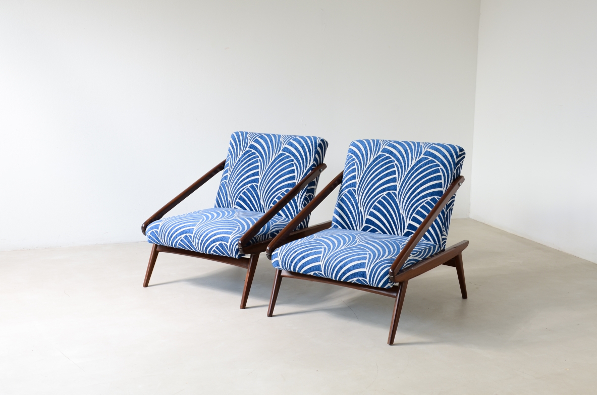 pair of wooden reclining armchairs, Made by ISA Bergamo in 1954.
