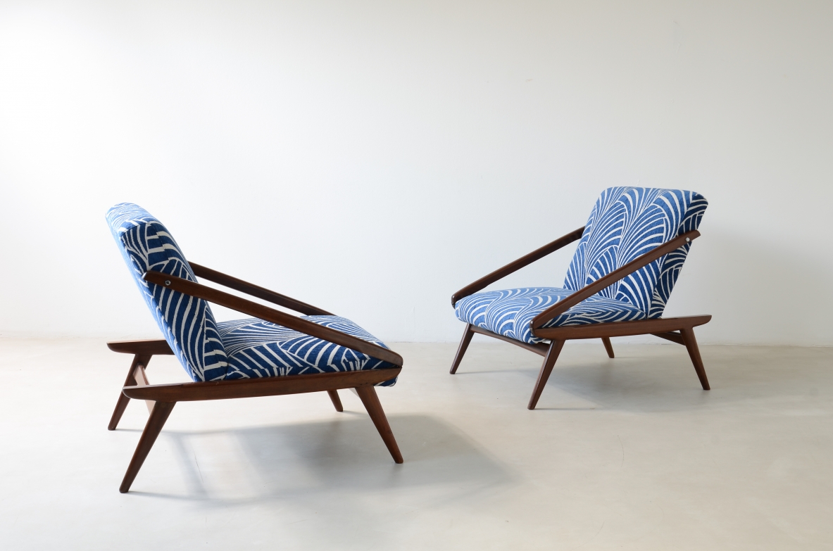 pair of wooden reclining armchairs, Made by ISA Bergamo in 1954.
