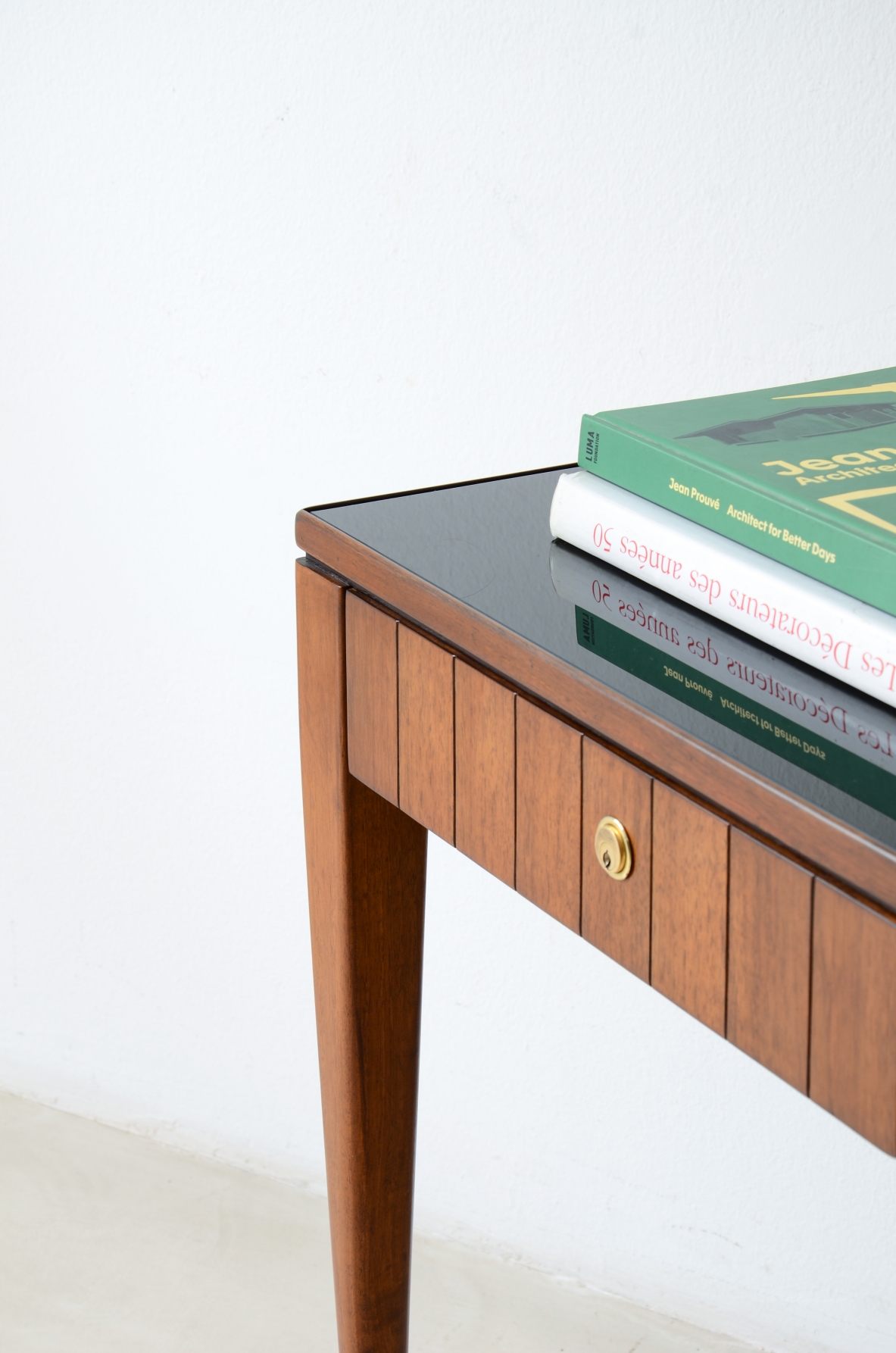 Paolo Buffa, Center console table, turned legs. Opaline glass top.  Italian manufacture, ca. 1955.
