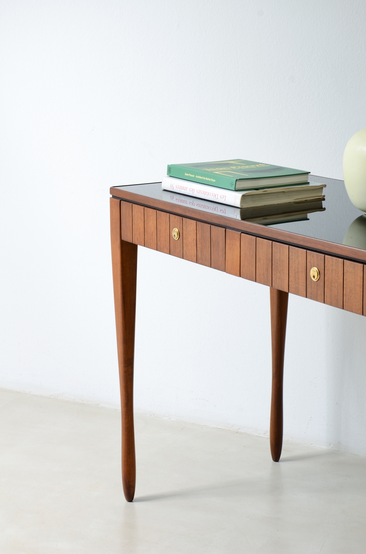 Paolo Buffa, Center console table, turned legs. Opaline glass top.  Italian manufacture, ca. 1955.