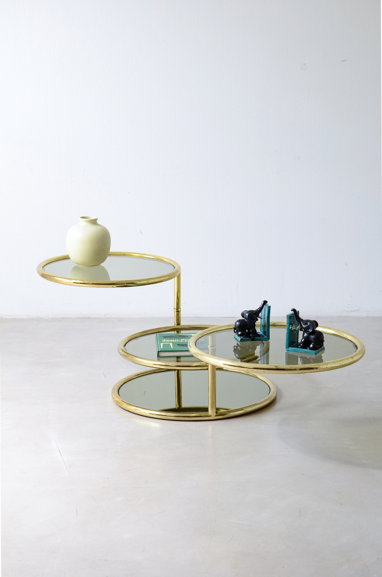 rounded brass coffee table