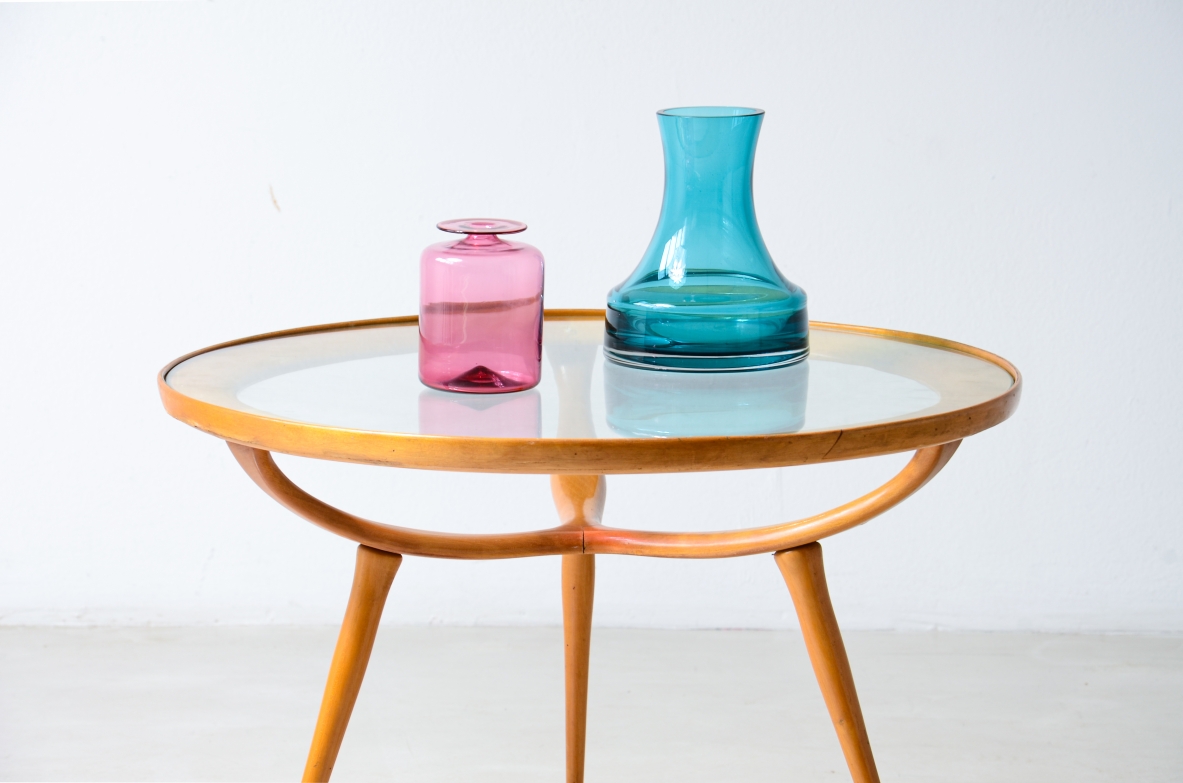 1950'S Cherrywood coffee table with a circular cut glass top.