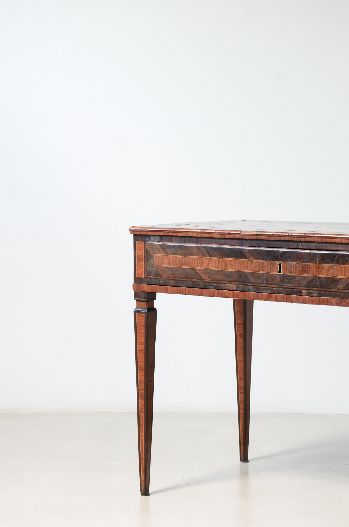 Elegant console table veneered in fine woods.  Italy, ca. 1780.