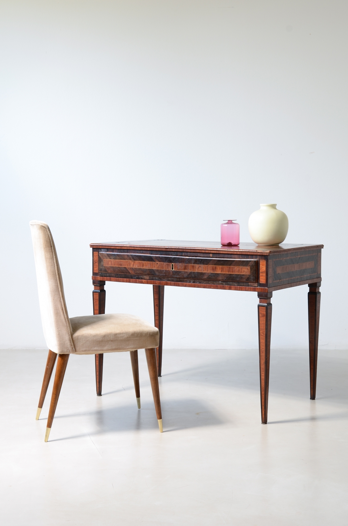 Elegant console table veneered in fine woods.  Italy, ca. 1780.