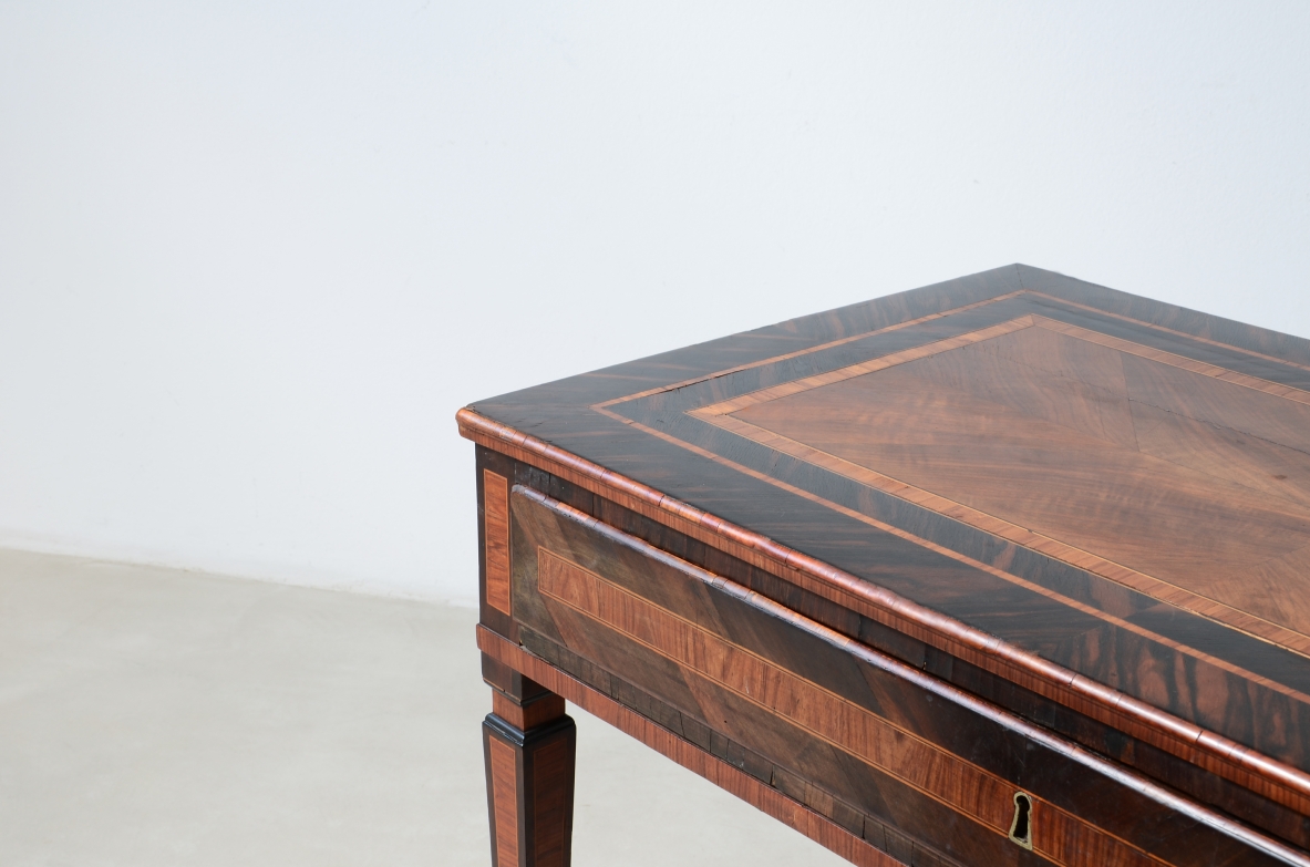 Elegant console table veneered in fine woods.  Italy, ca. 1780.