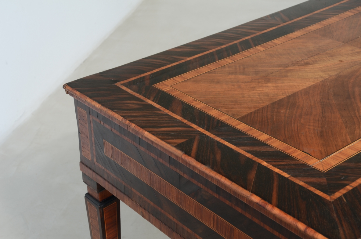 Elegant console table veneered in fine woods.  Italy, ca. 1780.
