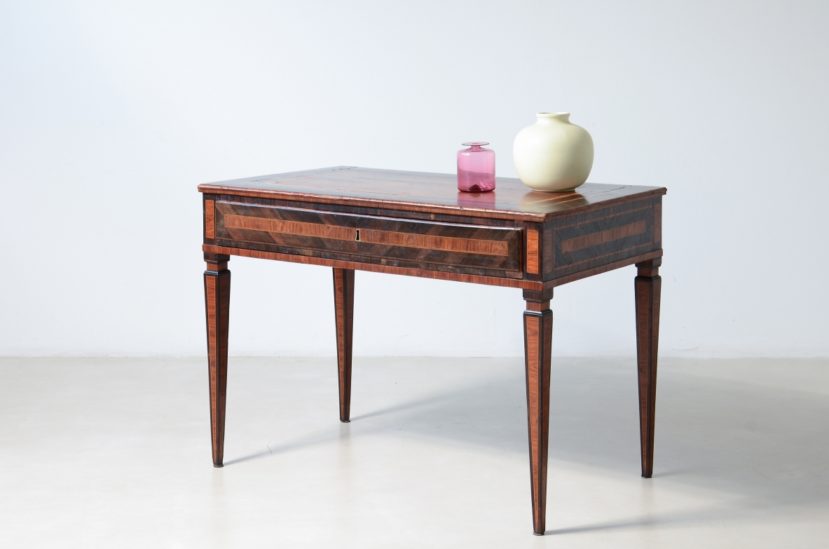 Elegant console table veneered in fine woods.  Italy, ca. 1780.