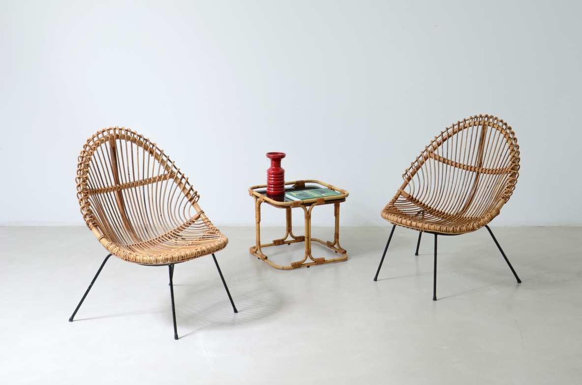 Pair of nice curved rattan chairs with metal legs, Italy1950's.
