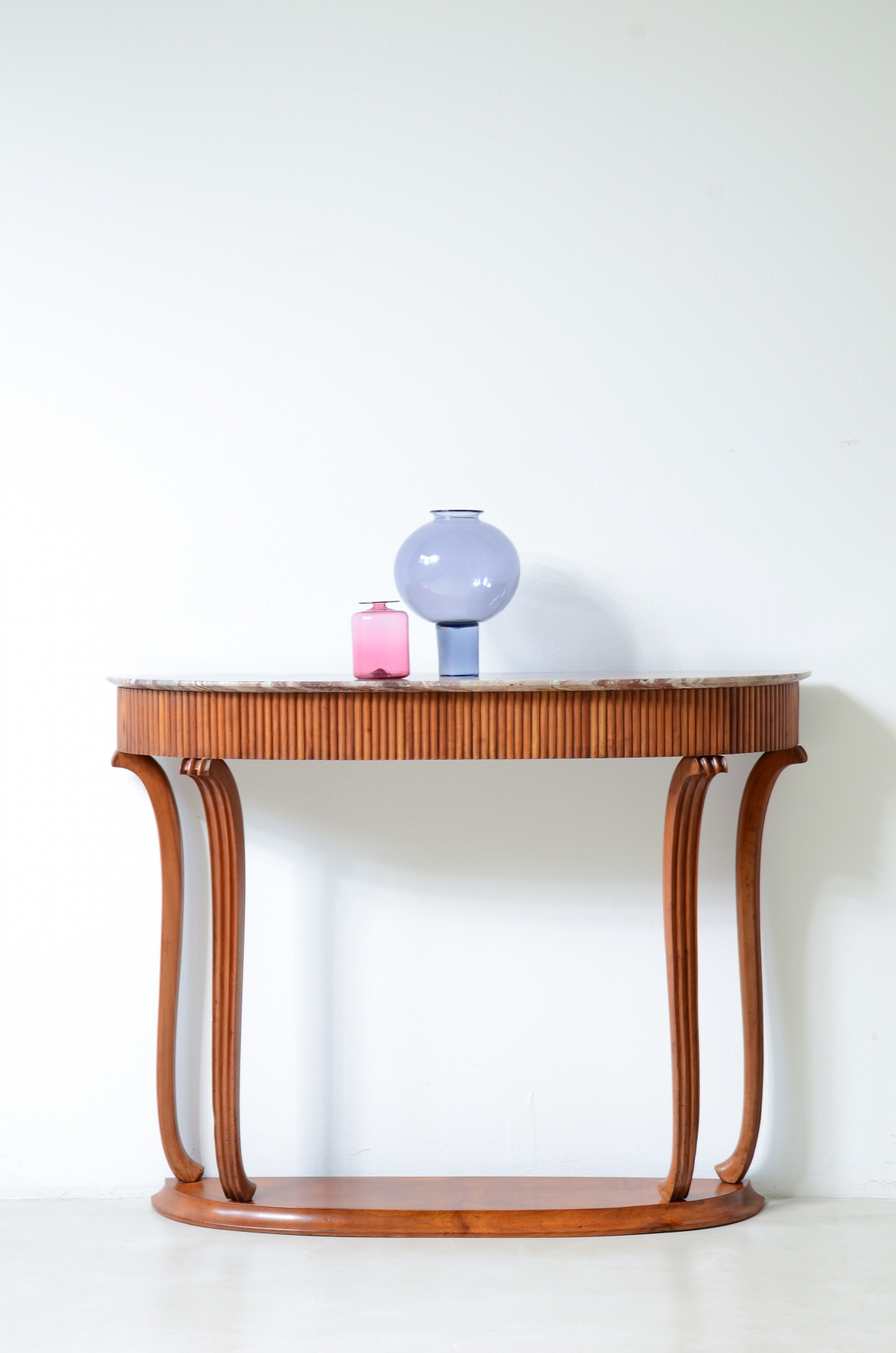 Elegant console table with a reeded wood band. Attr: Paolo Buffa, Italian manufacture, ca. 1940.