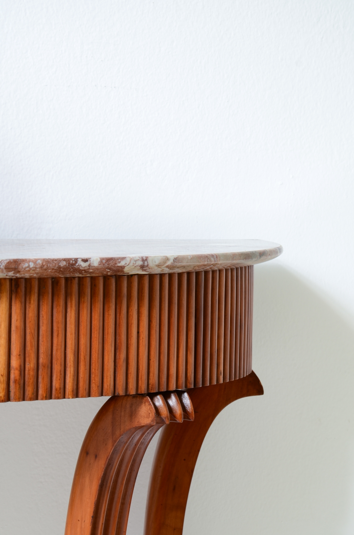 Elegant console table with a reeded wood band. Attr: Paolo Buffa, Italian manufacture, ca. 1940.