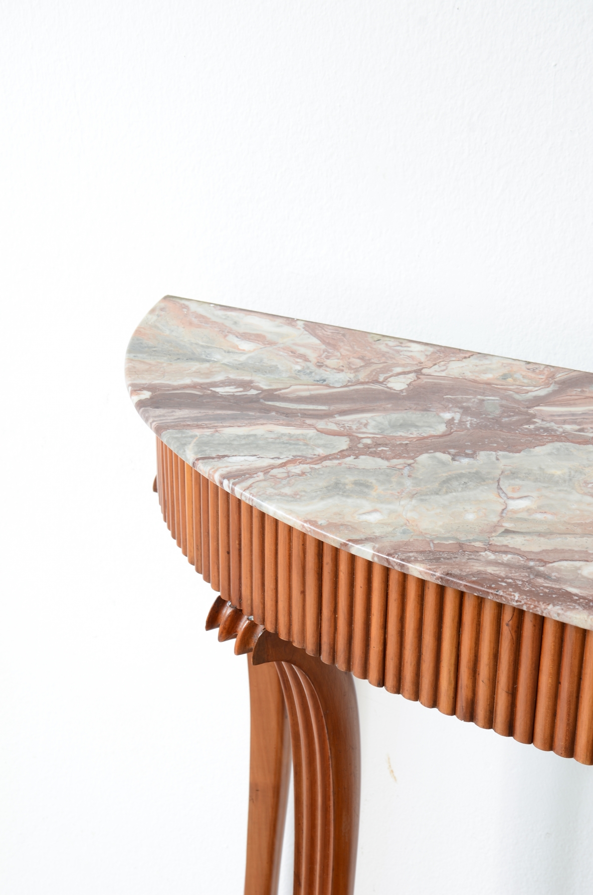Elegant console table with a reeded wood band. Attr: Paolo Buffa, Italian manufacture, ca. 1940.