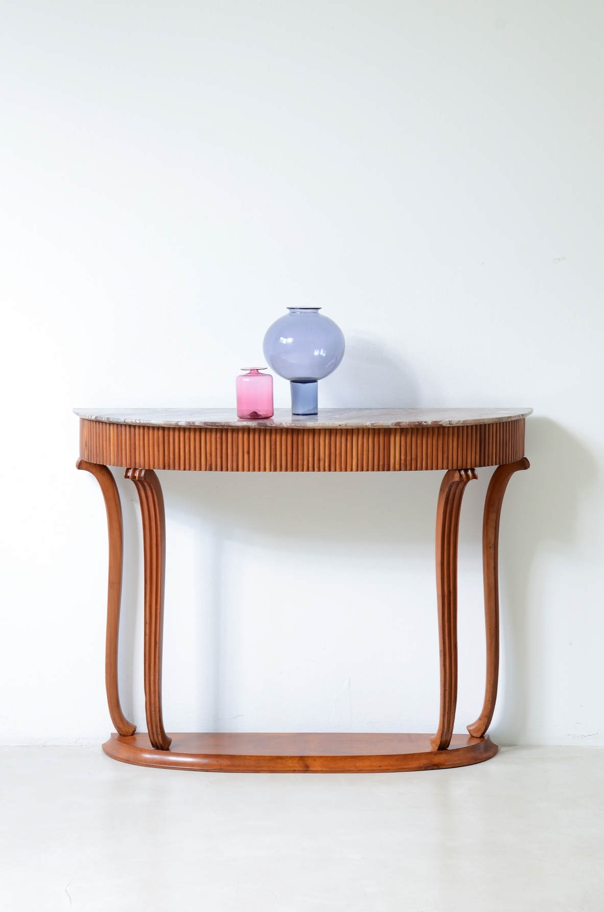 Elegant console table with a reeded wood band. Attr: Paolo Buffa, Italian manufacture, ca. 1940.