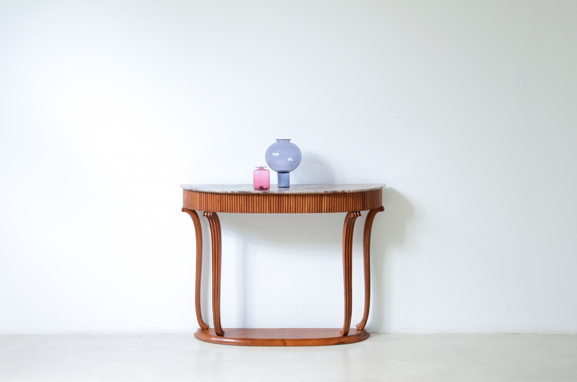 Elegant console table with a reeded wood band. Attr: Paolo Buffa, Italian manufacture, ca. 1940.