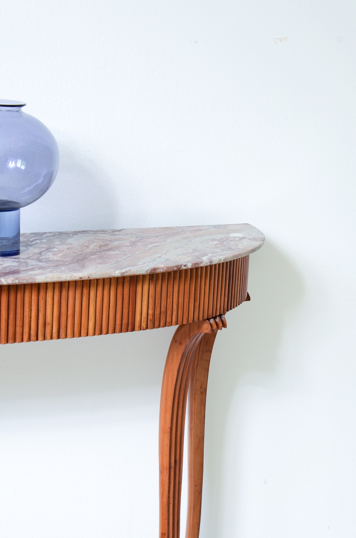 Elegant console table with a reeded wood band. Attr: Paolo Buffa, Italian manufacture, ca. 1940.