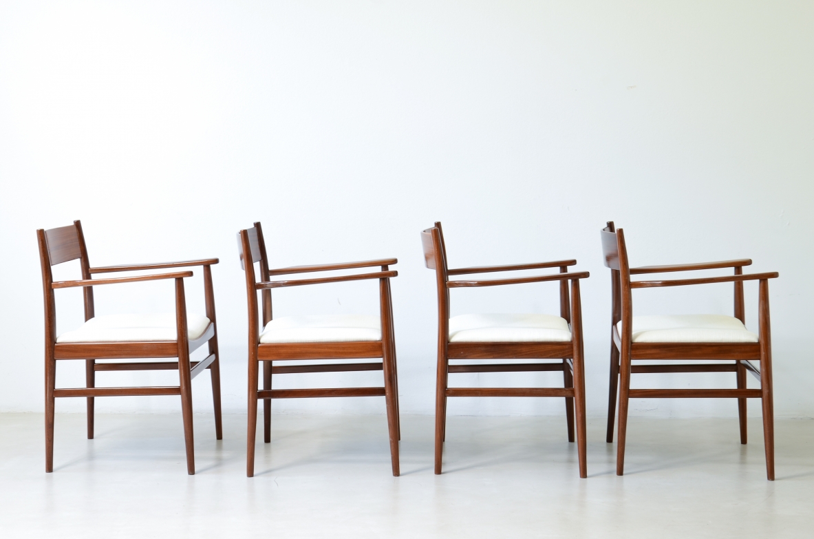 Rare set of 8 armchairs in shaped teak. Manufacture L. Jacobsen, ca. 1960.