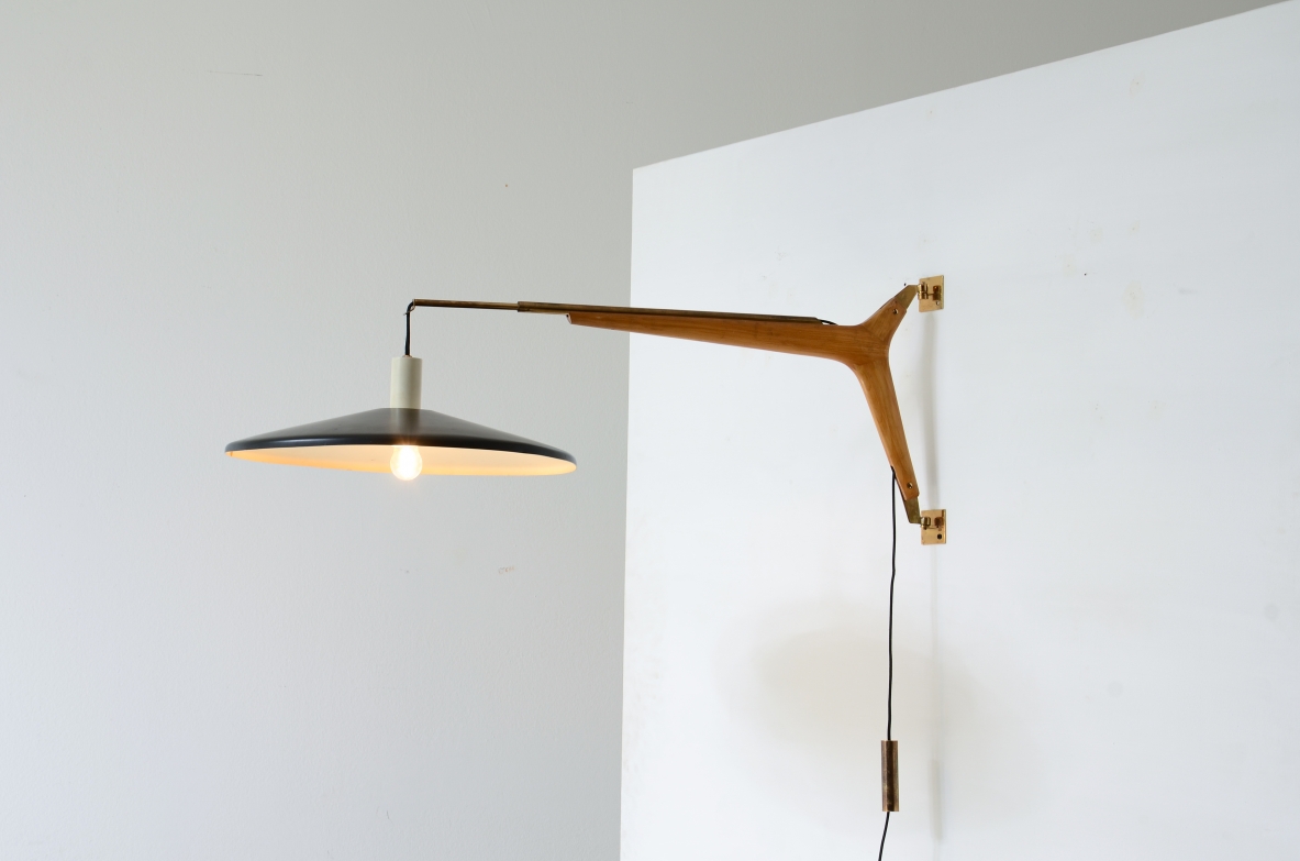 Franco Buzzi, wall lamp with extendable brass arm. Stilnovo 1950's
