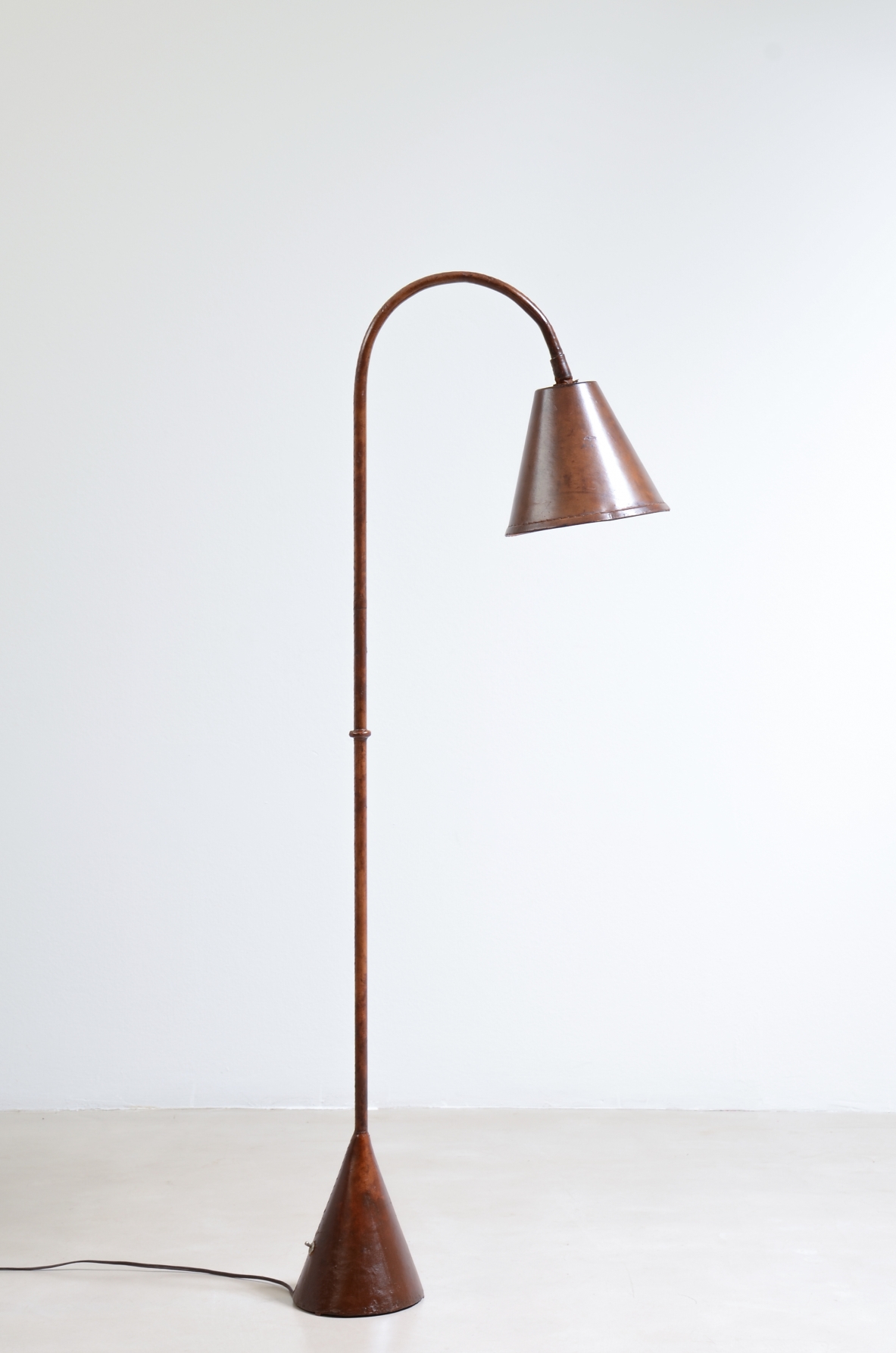 Jacques Adnet  Reading lamp entirely covered in leather. designed for Valenti, Spain, 1940.