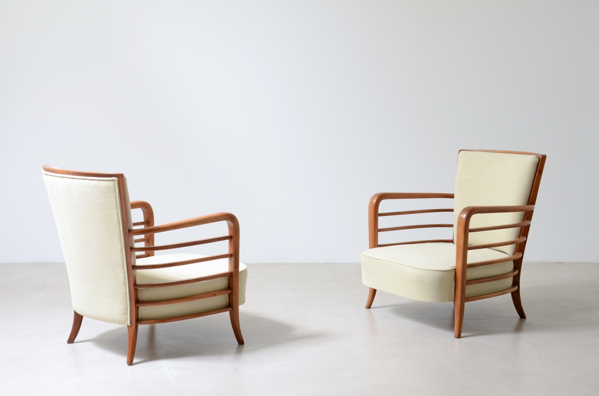 Pair of shaped cherrywood armchairs. Attribution: Paolo Buffa, ca. 1940.