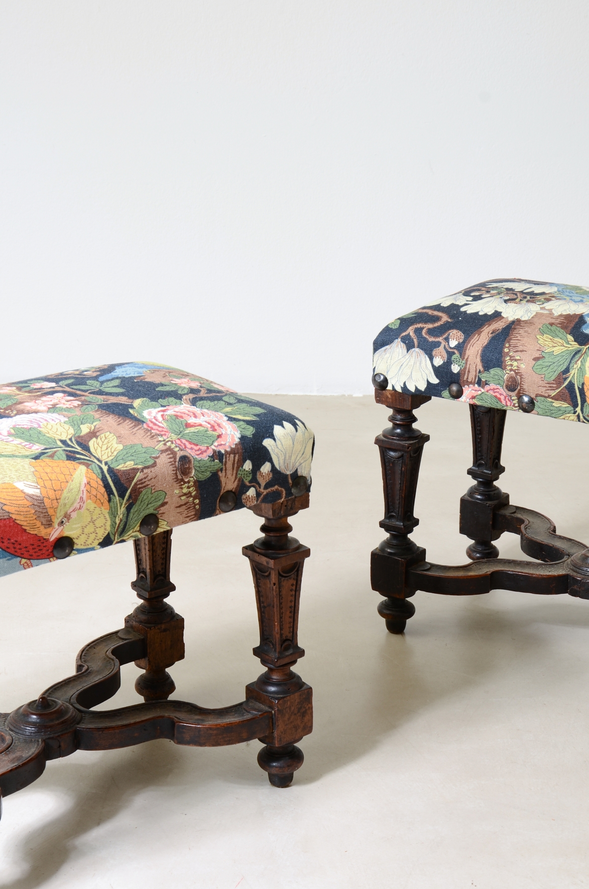 air of elegant stools featuring X-stretchers,Italian manufacture, Louis XIV period, circa 1680–1720.