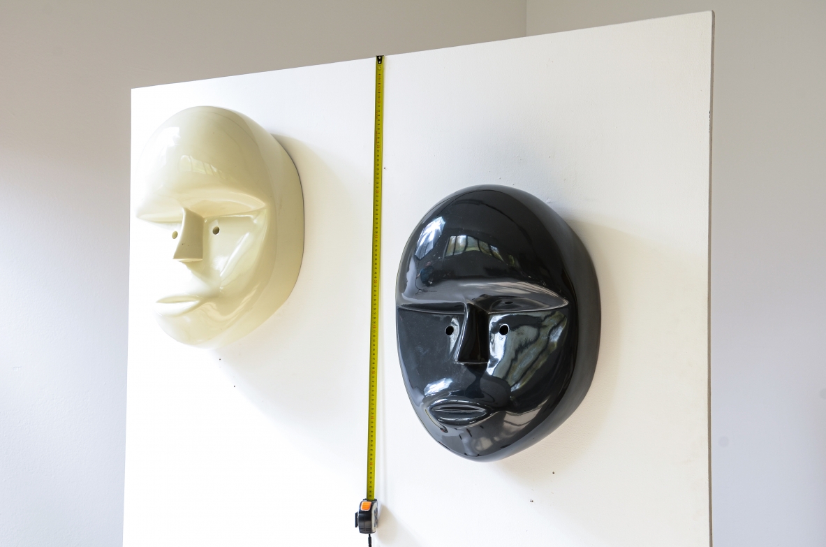 Pair of large lacquered fiberglass masks, Attributed to Joe Colombo; manufactured circa 1970.