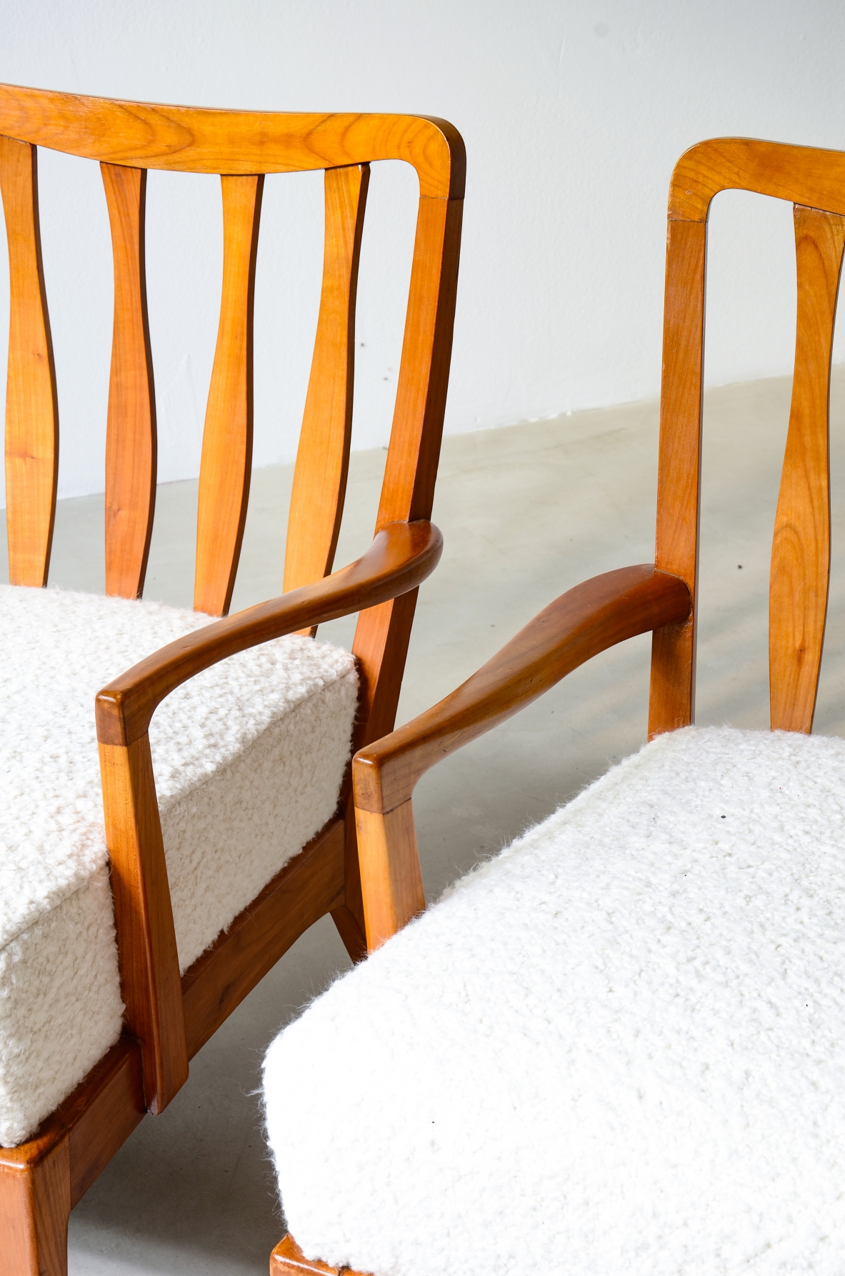 small armchairs in shaped cherry wood, Attributed to Paolo Buffa, circa 1940–50.
