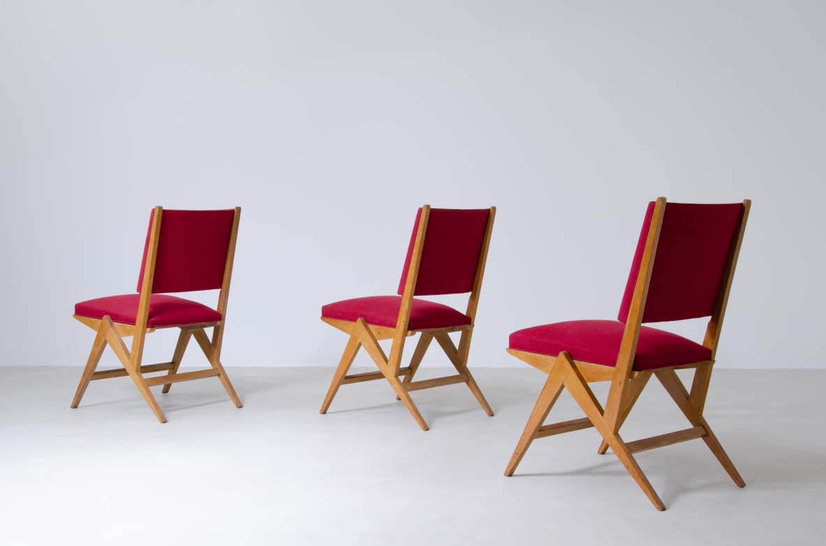 Set of six chairs in Oak with red fabric upholstery, France, 1950's.