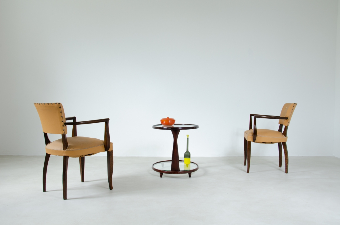 Pair of Art Deco chairs with armrests. France, 1940's.