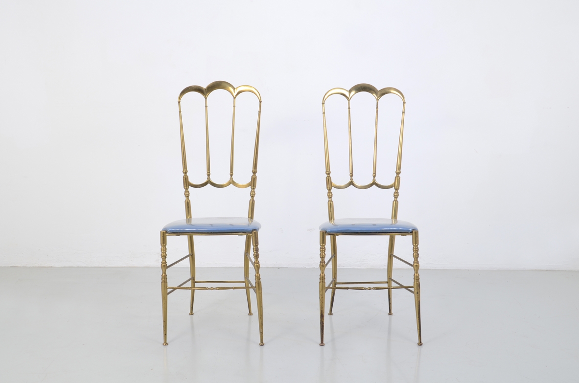 Pair of rare high back chairs in bronze, Italy 1950's.