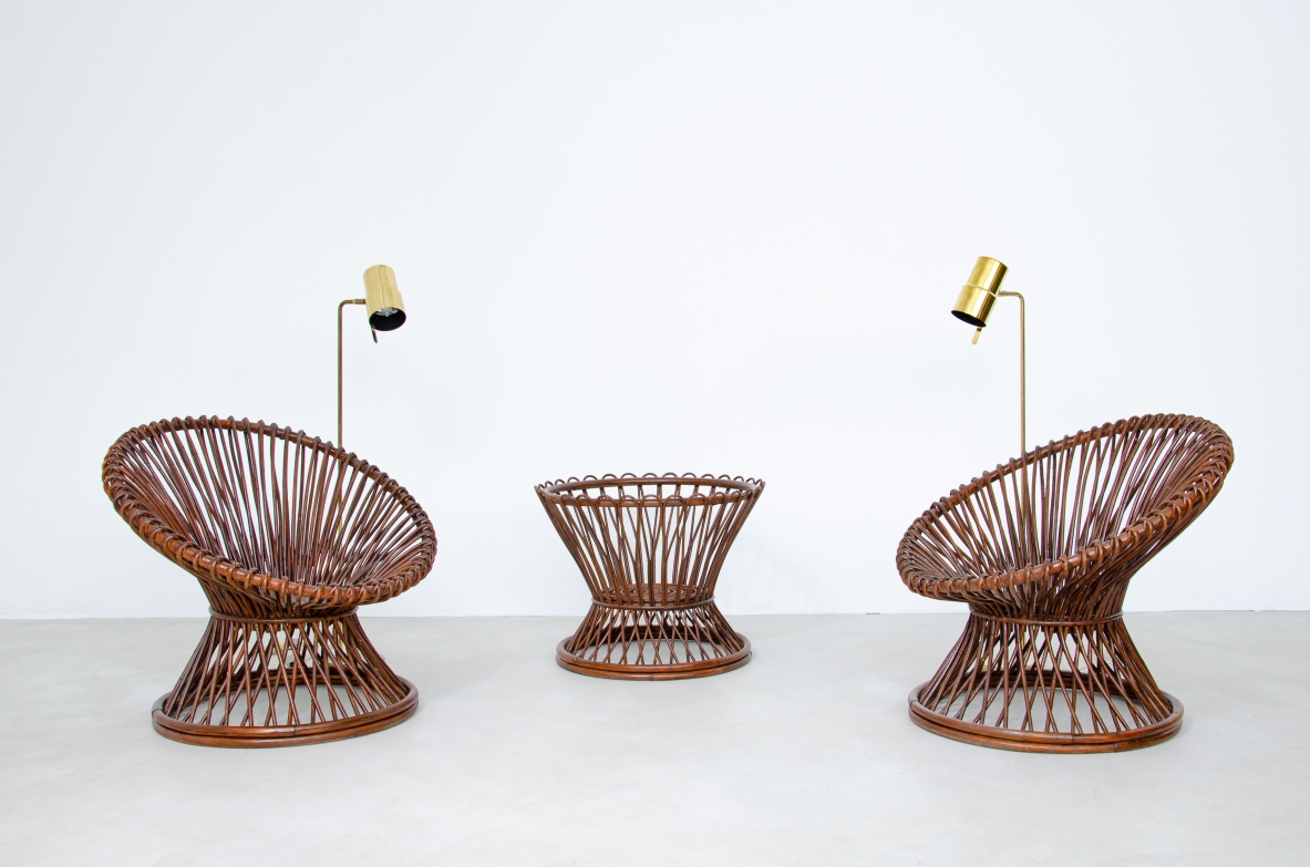Pair of nice 1950's armchairs in rattan with coffee table.