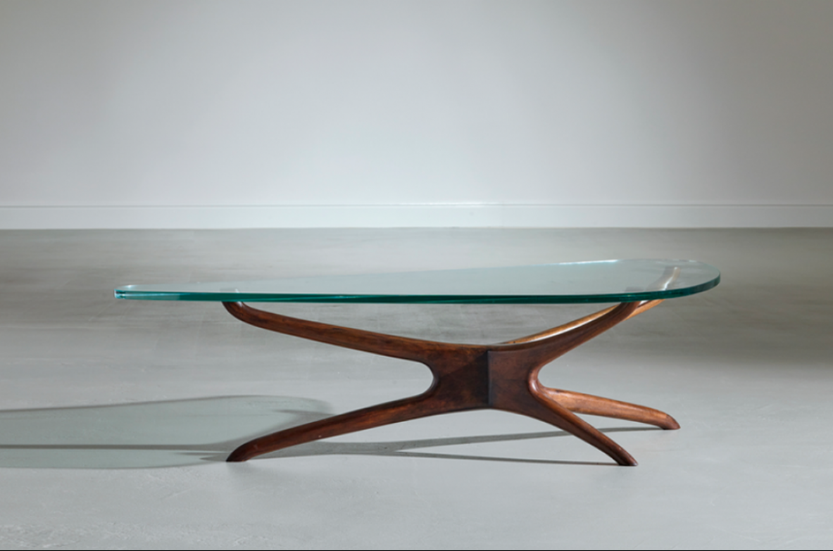 Vladimir Kagan. Raro tavolo in legno di noce con piano in cristallo di grande spessore. USA 1955 ca.