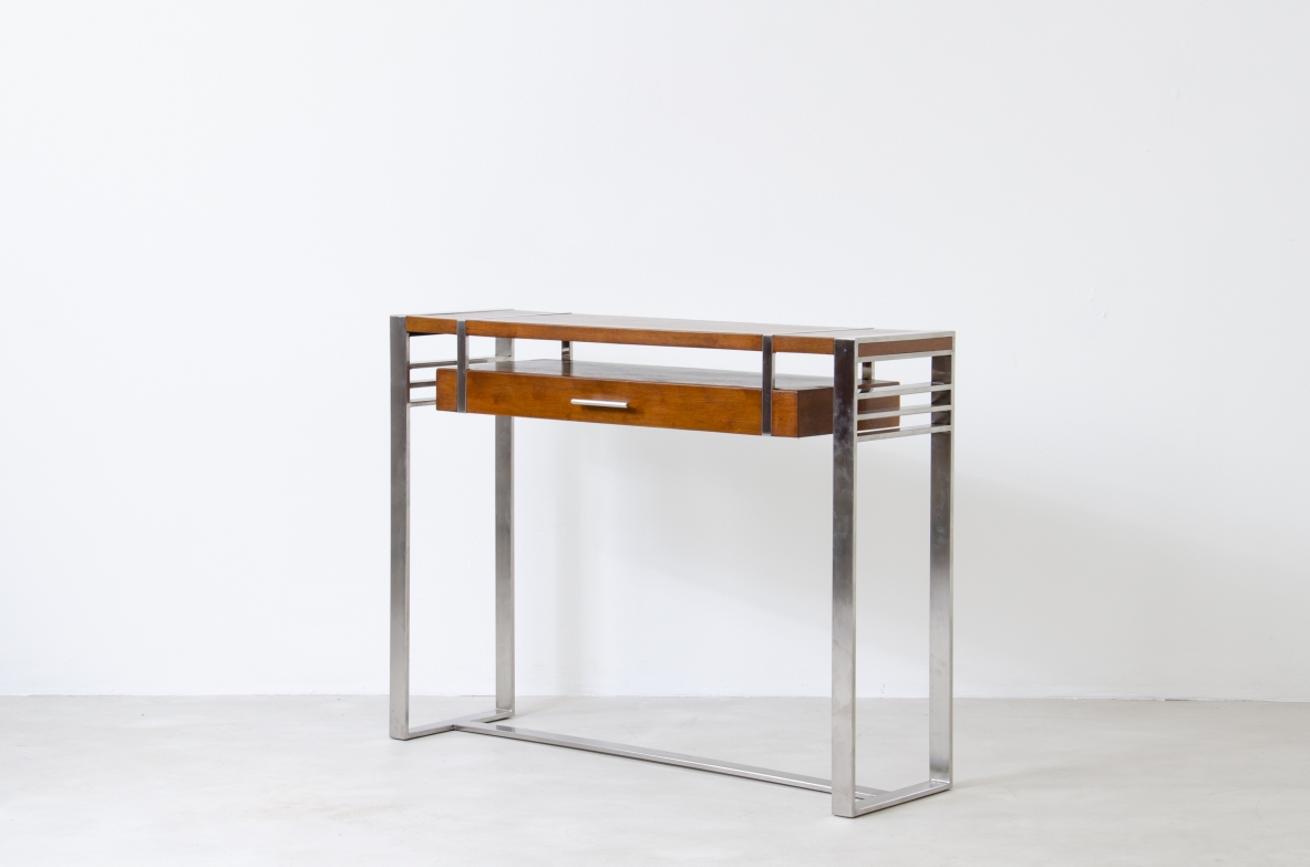 Modernist console table in steel and wood with one drawer.  France, 1935.