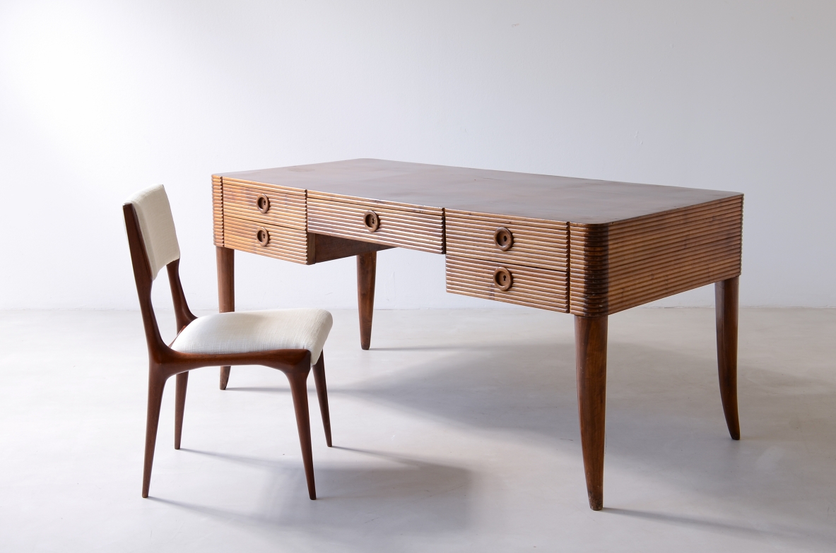Paolo Buffa (1903-1970)  Elegant wooden desk with five drawers and turned wooden legs.  Manufactured in 1940's.