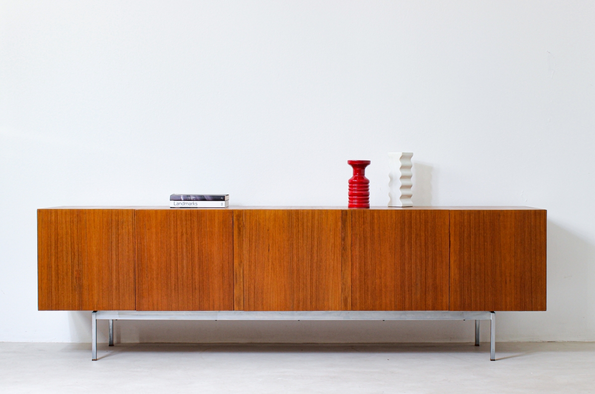 Container unit in blond wood with steel base. Italian manufacture, 1960's.