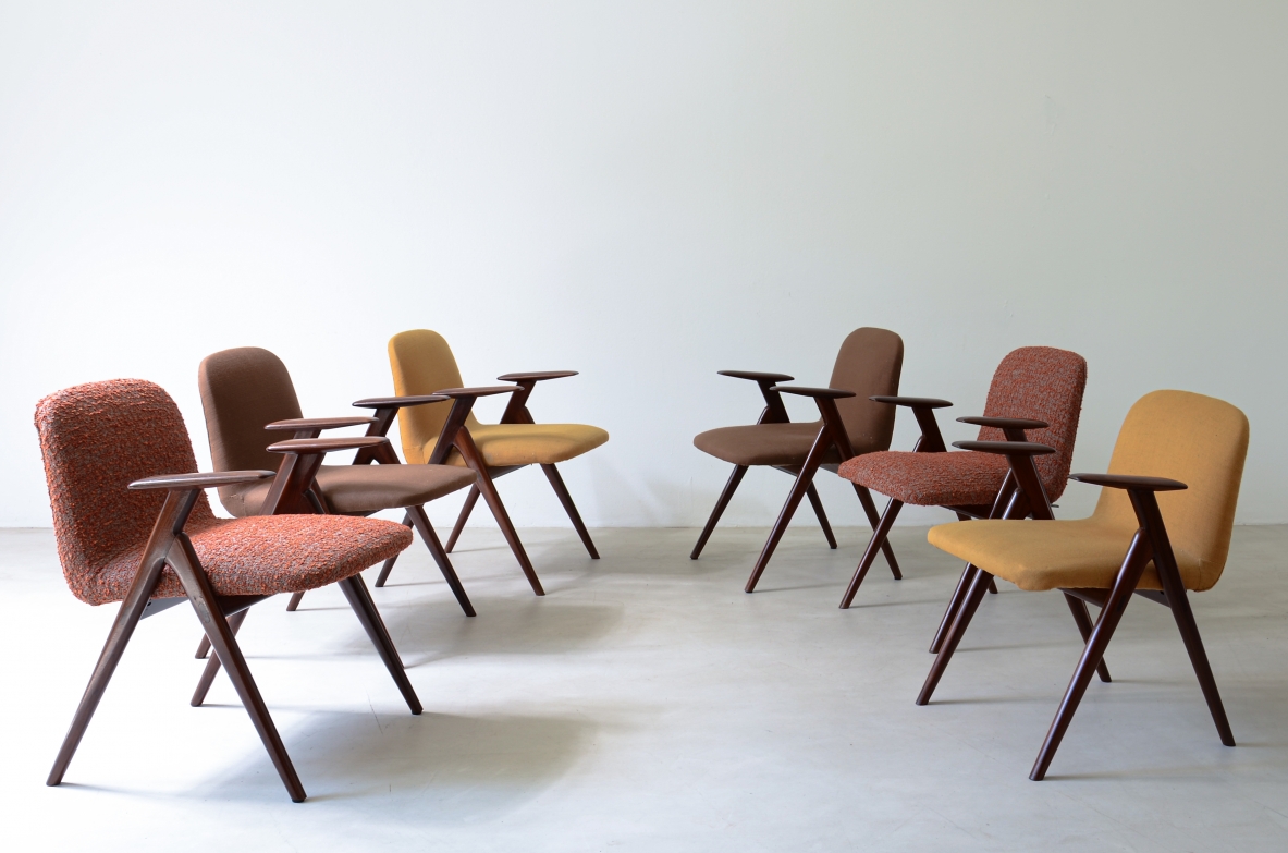 Luigi Vietti Six elegant armchairs in wood and padded fabric.1960's