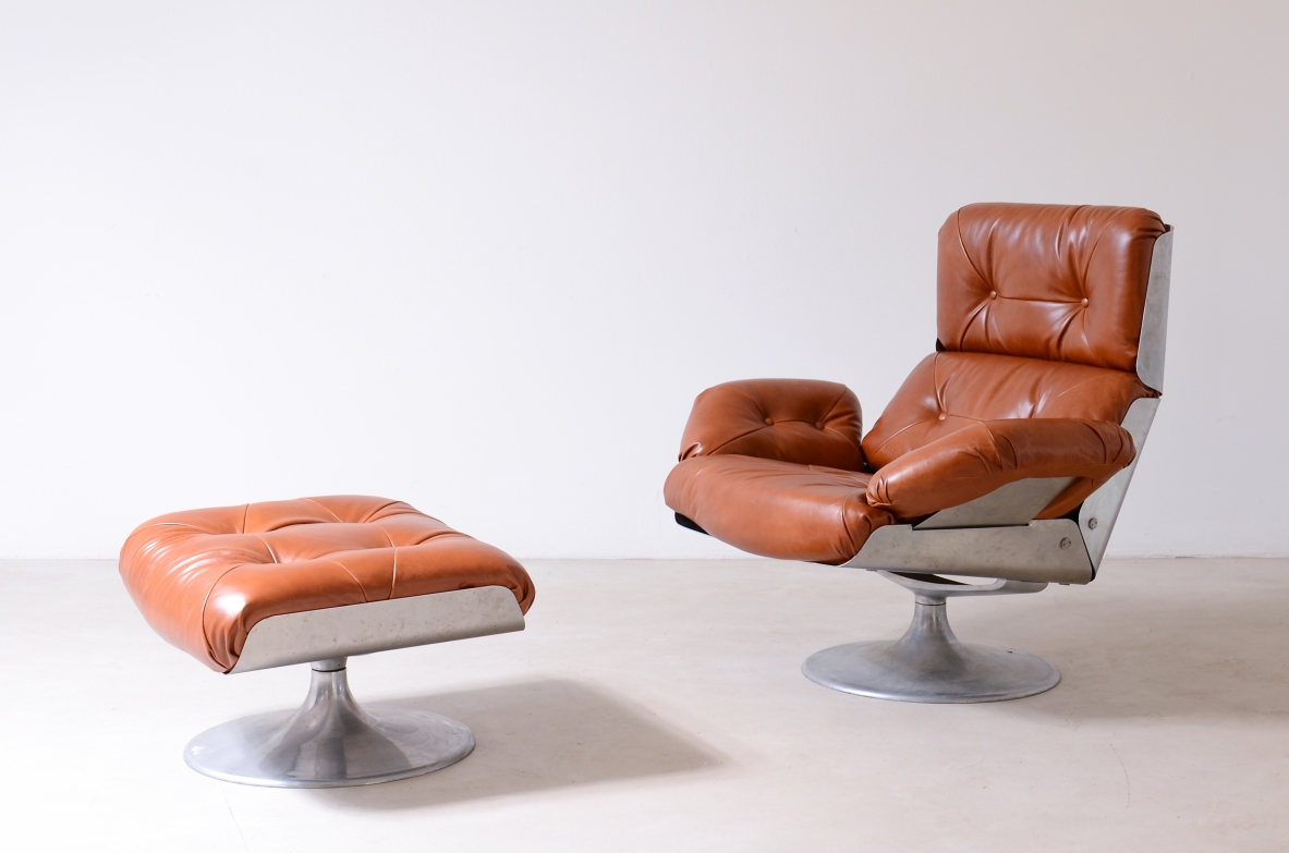 Xavier Feal  Rare swivel chair with footrest in curved steel and leather upholstery.  Inox Industrie, France, ca. 1970.
